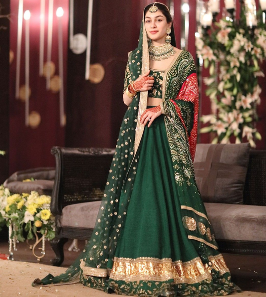 Designer dark green lehenga choli with bandhani dupatta