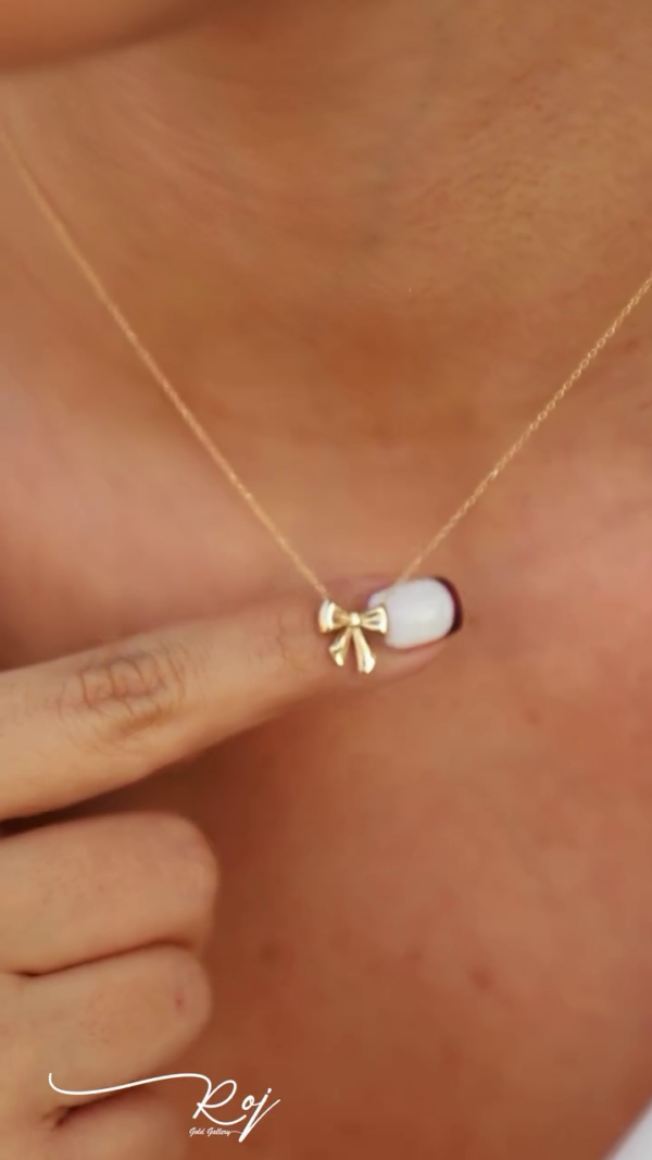 Delicate Bow Necklace: A Touch of Whimsy in Gold - Image 3